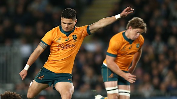 Noah Lolesio takes a kick during Saturday’s 33-25 loss to the All Blacks. 