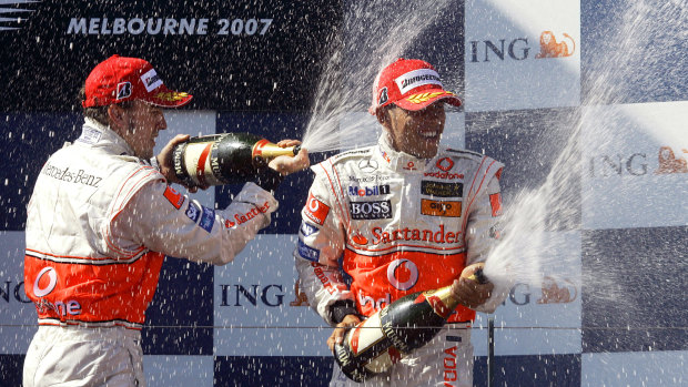 Hamilton finished third in Melbourne in 2007 and celebrates on the podium with Fernando Alonso.