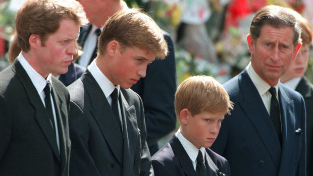 Princess Diana's sons Princes William and Harry with their father Prince Charles and uncle Earl Spencer outside Westminster Abbey on the day of their mother's funeral, September 1997.