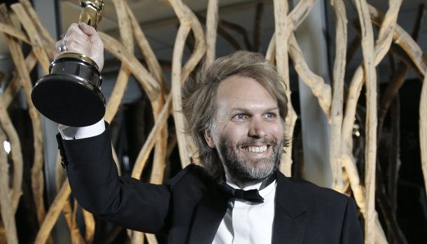 Florian Zeller with his Oscar for best adapted screenplay.