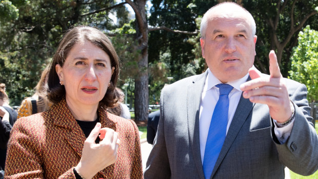 NSW Corrections Minister David Elliott, right, has apologised for raising allegations of harassment under parliamentary privilege. 