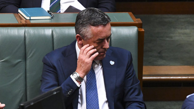 Australian Veterans' Affairs Minister Darren Chester reacts during the ministerial statement on Closing the Gap.