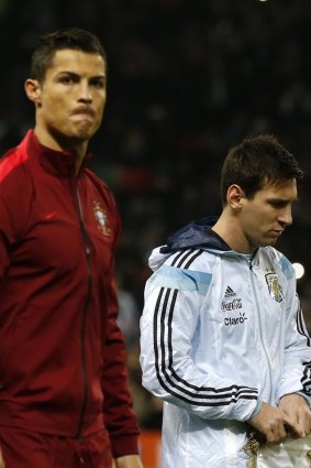 Ronaldo and Messi before a friendlyu between their countries in Manchester in 2014.