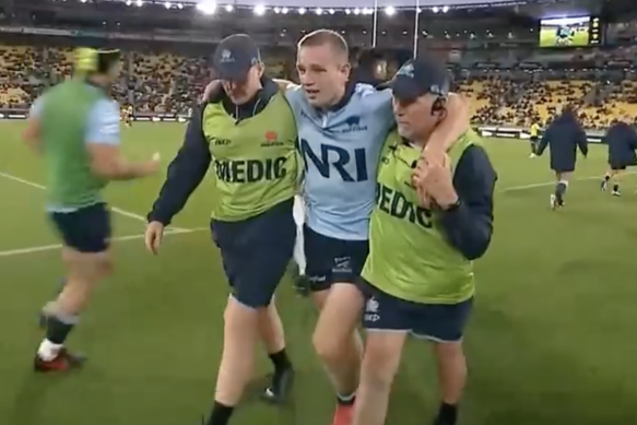 Max Jorgensen leaves the field injured against the Hurricanes