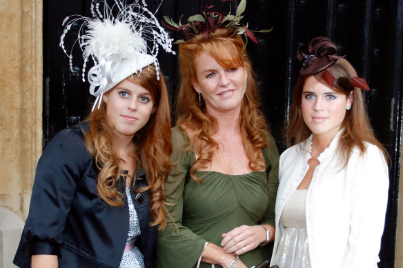 Sarah, Duchess of York (centre), in a file photo with her daughters, Princess Beatrice (left) and Princess Eugenie.