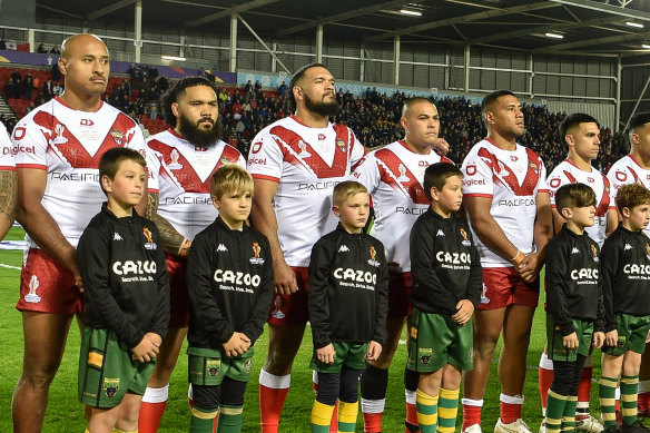 Felise Kaufusi (far left) battled emotions in his return for Tonga at the World Cup in England.