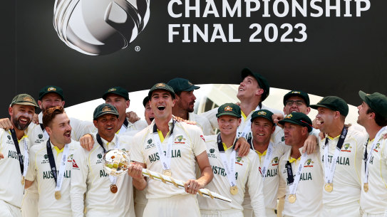 Australia lifts the World Test Championship trophy.