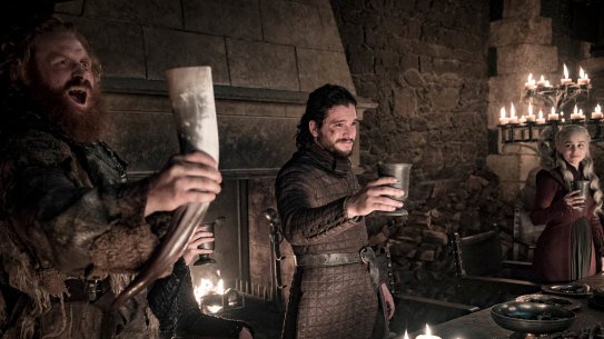 Get it downya: Tormund raises a horn to victory, Jon tries not to vomit.