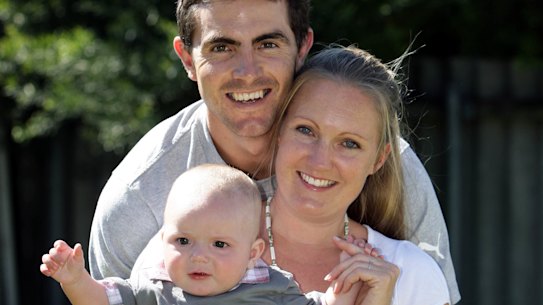 Jaymie Graham in 2008 with his partner Kasey and their son Hudson, who was then six months old. Jaymie had retired from AFL football to raise his family his younger sister, Candy, who was five at the time.