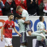 Bayern edge Mainz, close gap to leaders Dortmund
