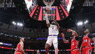 LeBron James drives to the basket in the Lakers games against the Chicago Bulls on Sunday. The NBA was forced to cancel five games. 
