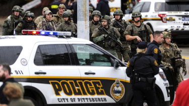 Police secure the area after a man opened fire at the Tree of Life synagogue in Pittsburgh.