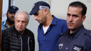 Bezeq telecom company's controlling shareholder Shaul Elovitch arrives at the magistrate court in Tel Aviv, Israel, in February, 2018.  Elovitch is suspected of involvement in a scandal in which Israeli Prime Minister Benjamin Netanyahu promoted regulation worth hundreds of millions of dollars for Bezeq in exchange for favourable coverage in the Bezeq owned Walla News site.
