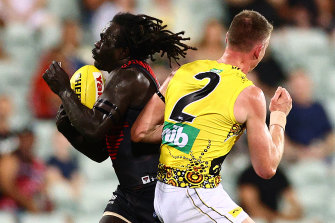 Dylan Grimes and Anthony McDonald-Tipungwuti were part of a controversial free kick call at the Dreamtime in Darwin game.