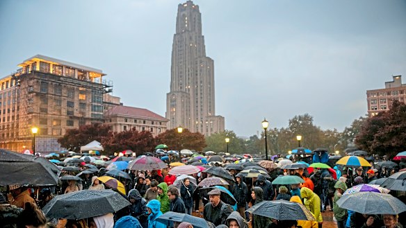 Mourners attend a vigil for the victims of the Tree of Life Synagogue mass shooting at Soldiers and Sailors Memorial Hall and Museum in Pittsburgh. 
