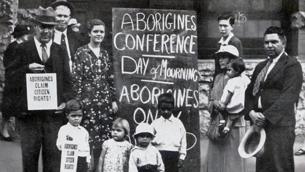 Day of Mourning protesters in Sydney on 26 January 1938. Left to right, William Ferguson, Jack Kinchela, Isaac Ingram, Doris Williams, Esther Ingram, Arthur Williams, Phillip Ingram, Louisa Agnes Ingram holding daughter Olive Ingram, Jack Patten. The young man standing directly behind Mrs Ingram is unknown.