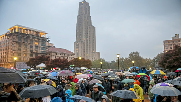 Mourners attend a vigil for the victims of the Tree of Life Synagogue mass shooting at Soldiers and Sailors Memorial Hall and Museum in Pittsburgh. 