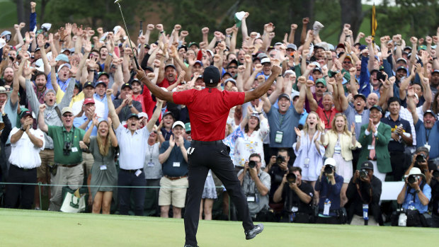 Glory daze: Tiger Woods celebrates victory in this year's Masters.
