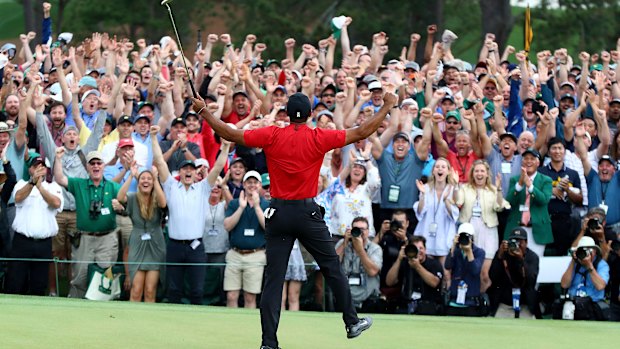 Glory daze: Tiger Woods celebrates victory in this year's Masters.