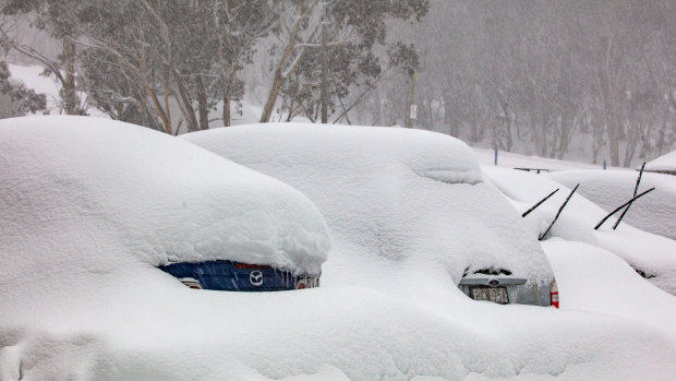 Snow fell as fire raged on Saturday. 