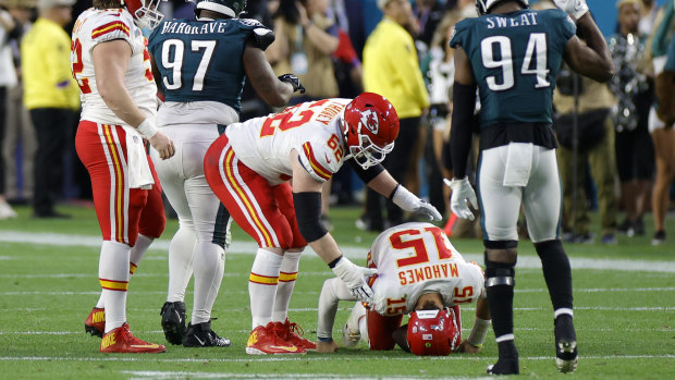 Chiefs quarterback Patrick Mahomes goes down injured in the second quarter.