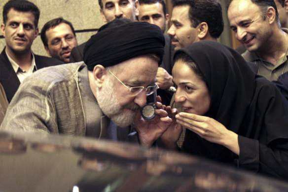 In this July 13, 2005, file photo, outgoing reformist Iranian president Mohammad Khatami with journalist Masih Alinejadin Tehran. 