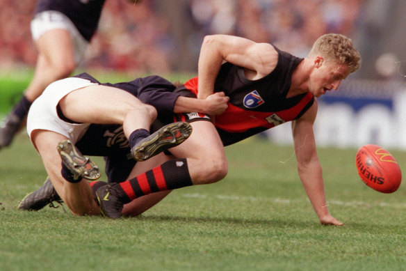 Players scramble for the ball.