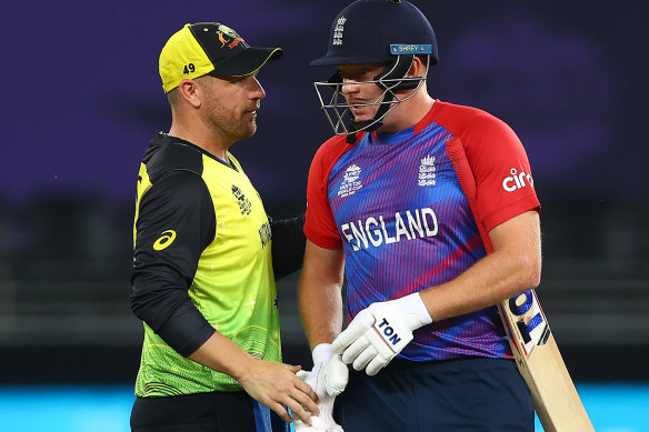 Finch and England’s Jonny Bairstow chat after Australia’s loss to England earlier in the tournament.