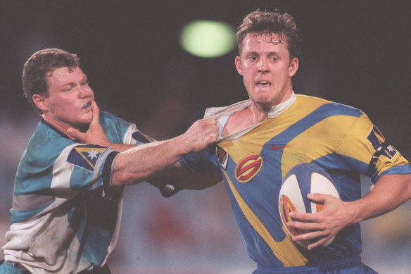 One-season wonders: Scott Hill makes a charge for the Newcastle-based Hunter Mariners in 1997. The Super League club was disbanded when the NRL was formed later that year.