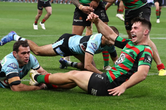 Lachlan Ilias celebrates a try in Saturday’s win over Cronulla.