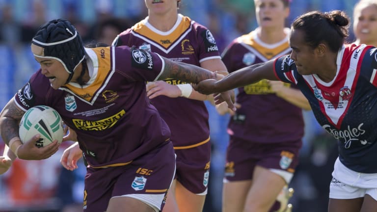 Hard yards: Rona Peters makes a break in the showpiece event of the women's game.