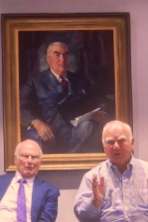 Richard Alston and Alan Stockdale underneath a portrait of Liberal Party founder Robert Menzies.  