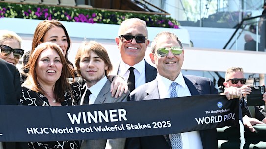 Owner Jonathan Munz, right, after Getta Good Feeling won the Wakeful Stakes. He is pictured with John Kanga and MRC CEO Tanya Fullarton, front left.
