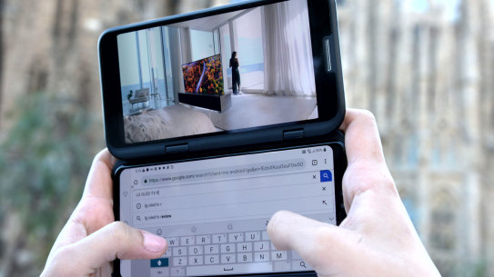 A removable cover gives the V50 a secondary screen so you can use two apps at once.