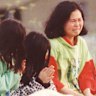 Phyllis Chan and her daughters Karen, 8, and Karly, 10, grieve and pray at the site in Thomastown where her daughter Karmein’s body was found in 1992, some time after being abducted from the family home. Her killed was dubbed Mr Cruel and The Age reported in 2024 detectives believed he may have killed himself, died of natural causes or moved to a country that is lax on child exploitation.