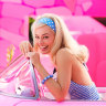 Is the Barbie movie satire? A joyful ode to girl power? Yes and yes!
