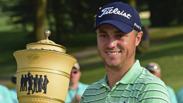 Dedication: Justin Thomas with the spoils of victory.