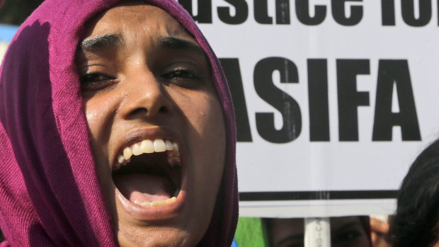 An activist shouts slogans at a protest against the incidence of rape and assaults in India.