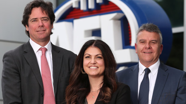(L-R) AFL CEO Gillon McLachlan, AFL head of mental health and wellbeing Dr Kate Hall and Lifeline Australia CEO Colin Seery at the launch of the AFL-Lifeline partnership. 
