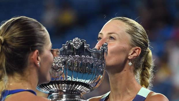 Timea Babos of Hungary and Kristina Mladenovic of France pose after winning the women's doubles championship at this year's Australian Open in January.