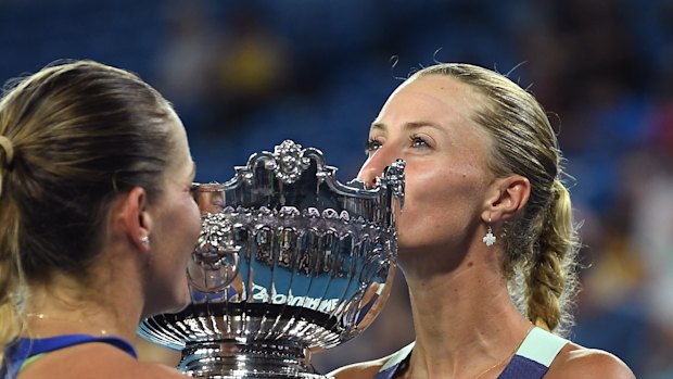 Timea Babos of Hungary and Kristina Mladenovic of France pose after winning the women's doubles championship at this year's Australian Open in January.