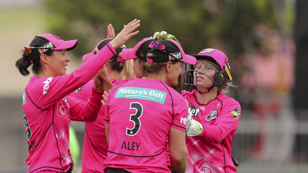 Tickled pink: The Sixers will be hoping to have more to celebrate this weekend in the WBBL final.