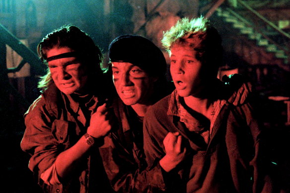 Corey Feldman, Corey Haim and Jamison Newlander in <i>The Lost Boys</i>.