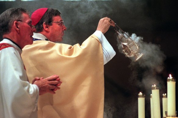 Then-archbishop George Pell during Christmas Mass at St Patrick’s Cathedral in 1997. 