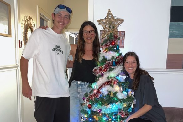 Angus with his mum Stacey and sister Molly.