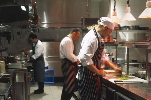 Capaldi (centre) in the Fenix kitchen in 2000. The young chef on the left is Calombaris' MasterChef colleague Gary Mehigan.