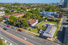 The 810-square-metre corner site in an area with residential zoning for a 15-metre building at 11-13 Stevens Street in Gold Coast’s Southport sold by private treaty for $1.5 million. It was bought by the buyer of the neighbouring 15 Stevens Street site. 