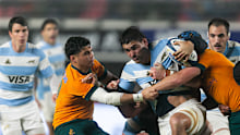 Pablo Matera of Argentina is tackled by Noah Lolesio and Hamish Stewart of Australia.
