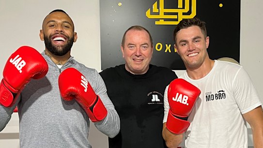 Bulldogs winger Josh Addo-Carr, Paul Gallen’s boxing trainer Graham Shaw and Canterbury halfback Kyle Flanagan after a boxing session