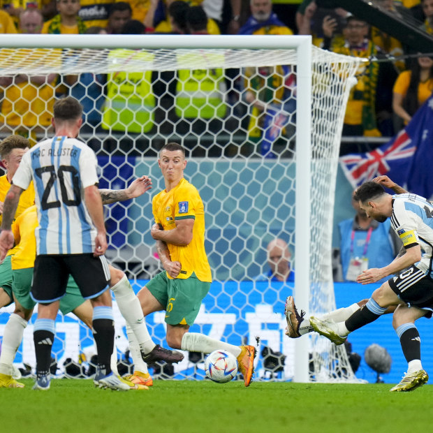 Lionel Messi lines up the shot.